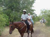 Campers on horseback
